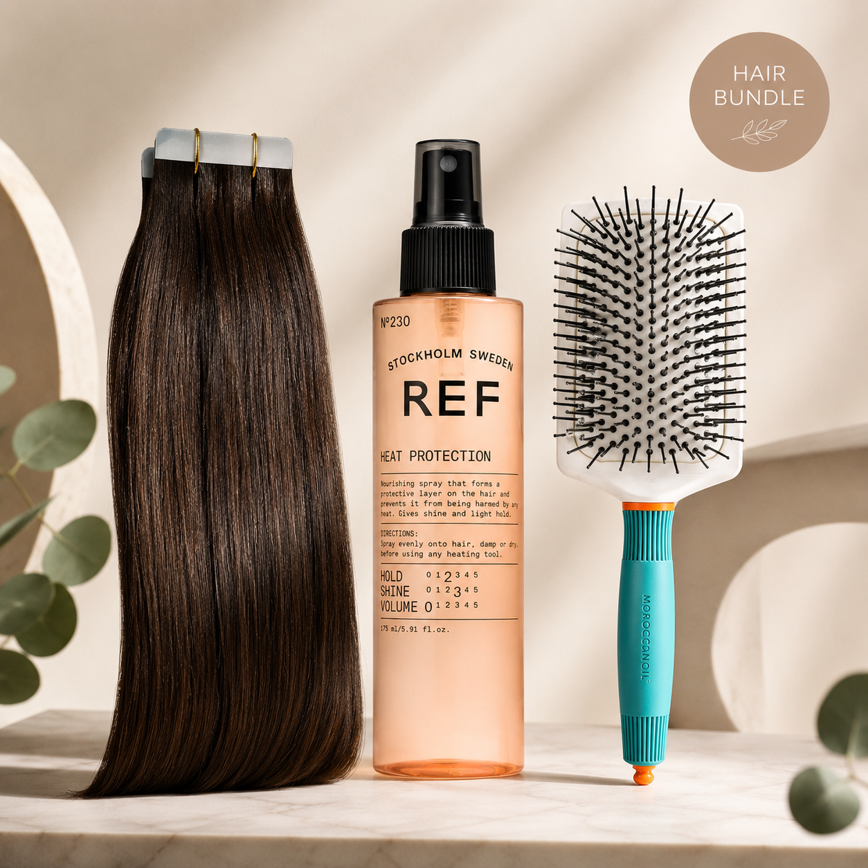 Tape-in hair extension care bundle featuring dark brown tape-in hair extensions, REF Heat Protection spray and a Moroccanoil paddle brush on a neutral background.
